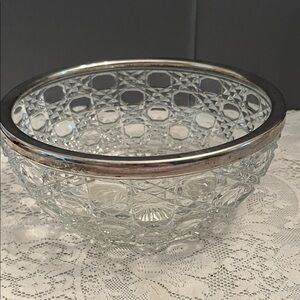 Beautiful Glass Serving Bowl with Silver Rim.